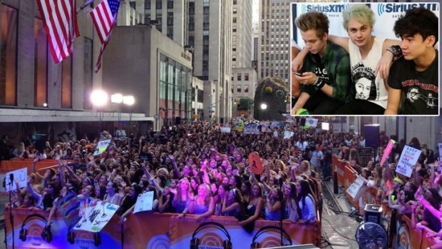 The record crowds at Rockefeller Centre, NYC, for Five Seconds of Summer (inset). 