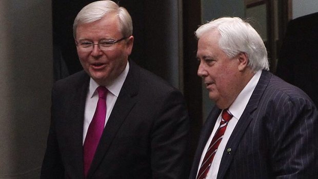 Kevin Rudd and Clive Palmer arrive for the opening of Parliament.