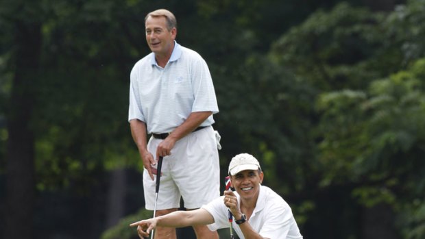 Barack Obama on the golf course with House Speaker John Boehner.