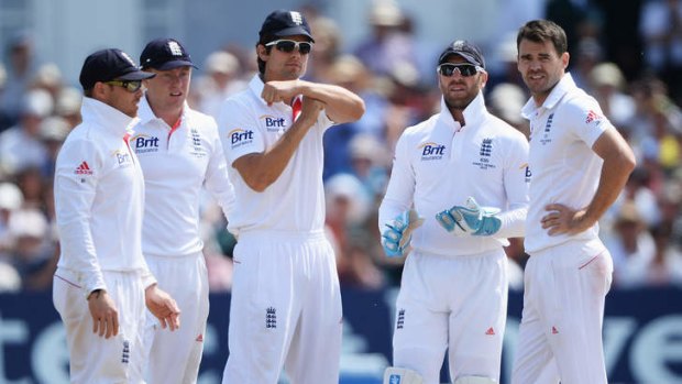 England captain Alastair Cook refers the decision to the third umpire after   James Anderson's appeal for the wicket of Brad Haddin.