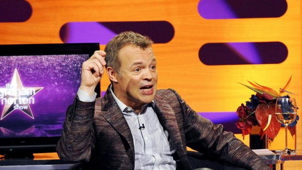 Host Graham Norton struggles to get a word in between commercials on <i>The Graham Norton Show</i>.