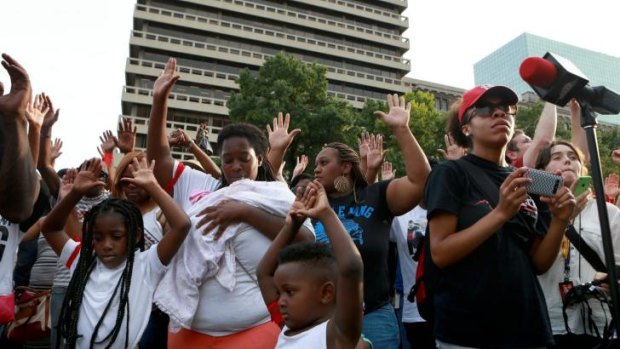 People in more than 90 cities observed a National Moment of Silence in the wake of the fatal shooting of Michael Brown.