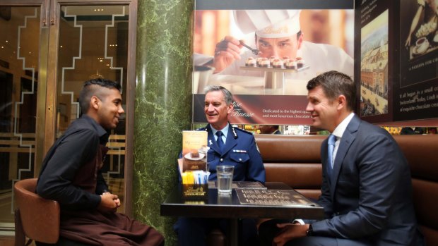 Premier Mike Baird and Police Commissioner Andrew Scipione at the Lindt cafe one year after the siege.