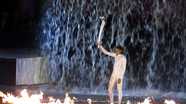 Cathy Freeman lights the Olympic flame during the Opening Ceremony of the Sydney Olympics.