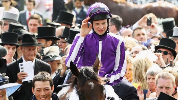 Favourite salutes: Joseph O'Brien acknowledges the crowd after Camelot's Derby win.