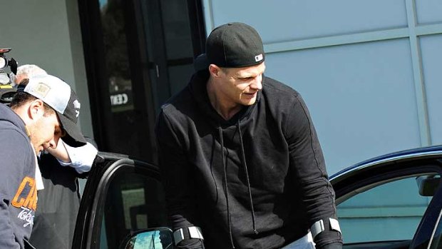 St Kilda captain Nick Riewoldt arrives at Linen House on crutches to meet with club this morning.