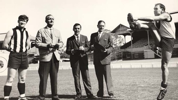 Helping Jim Cleary and Bruce Andrew judge Bob Skilton for the World of Sport Longest Kick Competition at the Junction Oval in St Kilda 1962.
