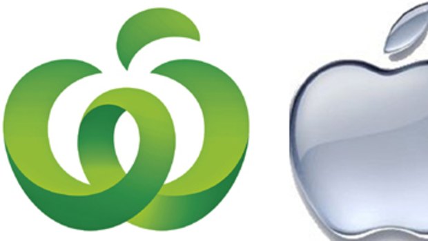 Brand battle... the logos of Woolworths, left, and Apple.