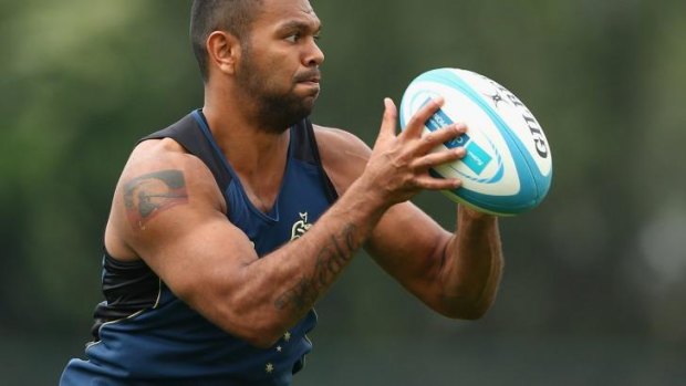 Up in the air: Wallabies utility back Kurtley Beale training in Mendoza.