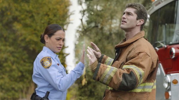 Trapped: Natalie Martinez and Josh Carter live in a community cut from society in Stephen King's work, which has been generously interpreted for TV.