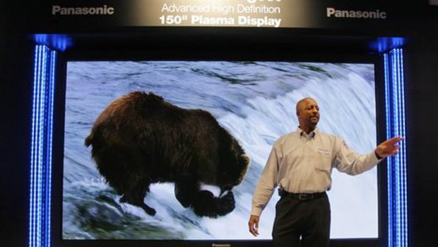Geoff Holman introduces Panasonic's 381 cm plasma television at the Panasonic booth at the Consumer Electronics Show (CES) in Las Vegas.
