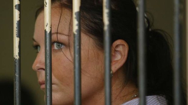 Schapelle Corby behind bars at Bali's Magistrates Court on April 28, 2005 after being caught at Denpasar Airport with 4.1 kilograms of marijuana in her boogie board bag.