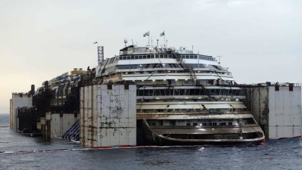 Technicians began a complex operation to refloat and tow away the wreck of the Costa Concordia, two and a half years after the luxury liner capsized off the Italian coast, killing 32 people.