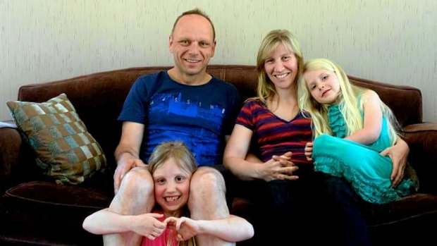 Marco de Vries and Rachel Sietzema and their children Rebecca, 7, and Shontai, 5.