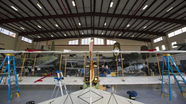 A reproduction Benoist airboat sits inside a hangar at Fantasy of Flight in Polk City, Florida.