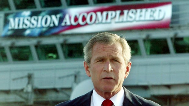 Then US President George W. Bush delivers the 'mission accomplished' speech.