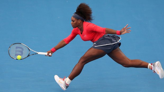 Serena Williams of USA plays a forehand in her match against Varvara Lepchenko of USA during day one of the Brisbane International at Pat Rafter Arena on December 30, 2012 in Brisbane, Australia.