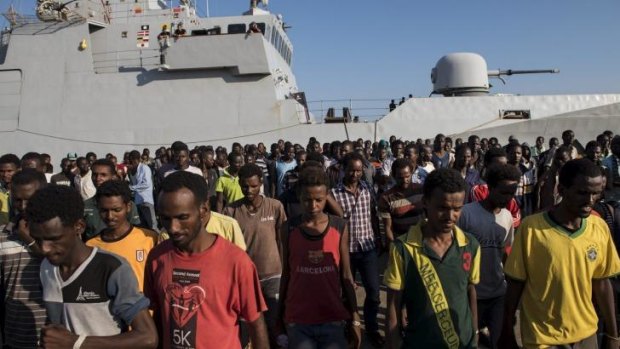 Steady stream: An estimated 400 people in up to 20 boats make the crossing each day.