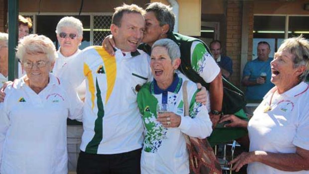 Tony Abbott bowls them over at the Kallangur bowling club in North Brisbane.