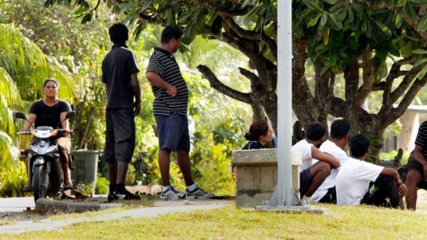 Nauru says services for asylum seekers (pictured on a brief excursion outside the processing centre) would be severely affected. 