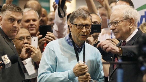 Friends in high places: Microsoft founder Bill Gates gets tips from his friend Warren Buffett.
