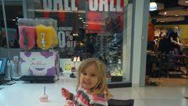 Questioned by police... Chris White found himself in trouble for taking this picture of his daughter Hazel in a Scottish shopping centre.