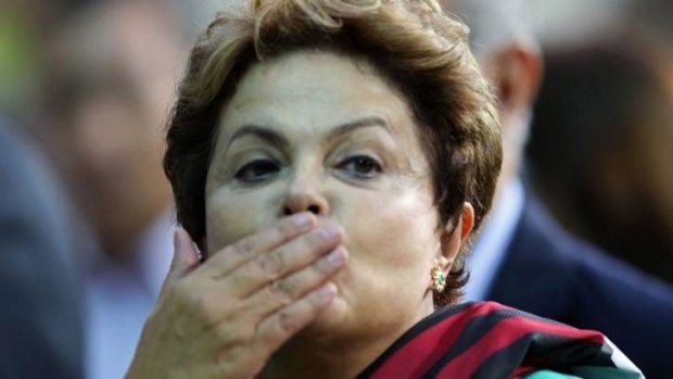 Brazilian President Dilma Rousseff blows a kiss. 