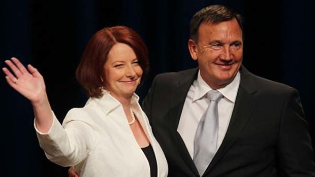 Prime Minister Julia Gillard with partner Tim Mathieson at the Melbourne Convention Centre