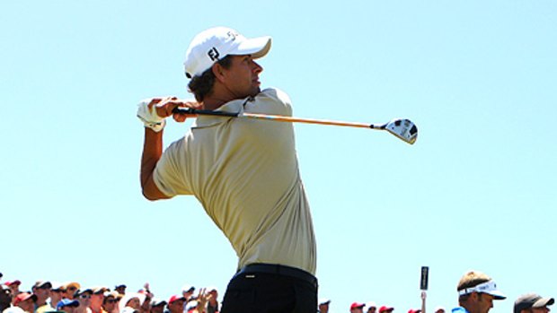 Adam Scott tees off on the third hole during the final round of the 2009 Australian Open at the New South Wales Golf Club.