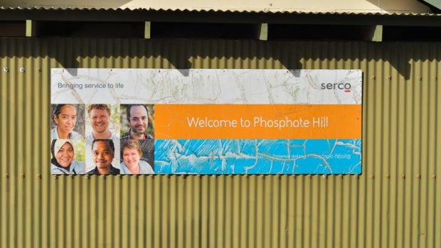 A welcome sign by management company SERCO adorns the side of a building at Phosphate Hill Detention Centre in Christmas Island.