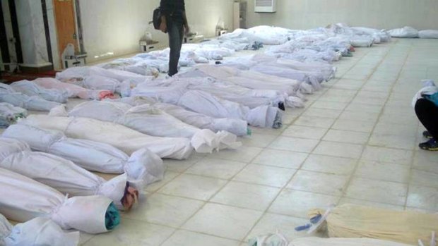 A handout picture released by the Syrian opposition's Shaam News Network shows bodies lying at a hospital morgue after the massacre at the central Syrian town of Houla.