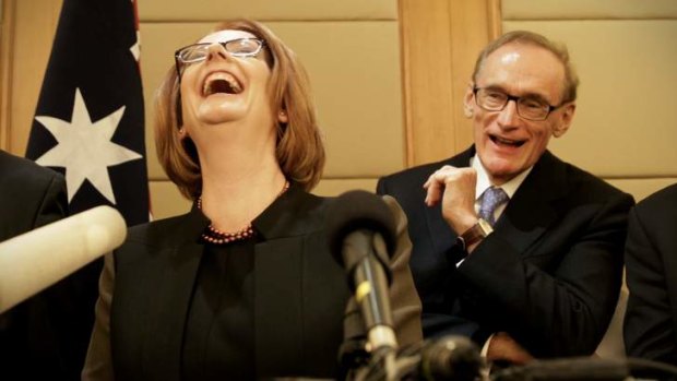 Julia Gillard and Bob Carr at a press conference in Beijing.