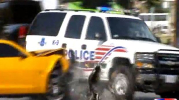 A Transformers 3 stunt car crashes into a real police car en rout to an emergency.