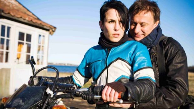 Noomi Rapace as Lisbeth Salander and Michael Nyqvist as Mikael Blomkvist in the original film.