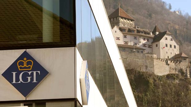 Historic haven: The logo of the LGT Group in Liechtenstein stands in sharp contrast to Vaduz Castle, home of the royal family.