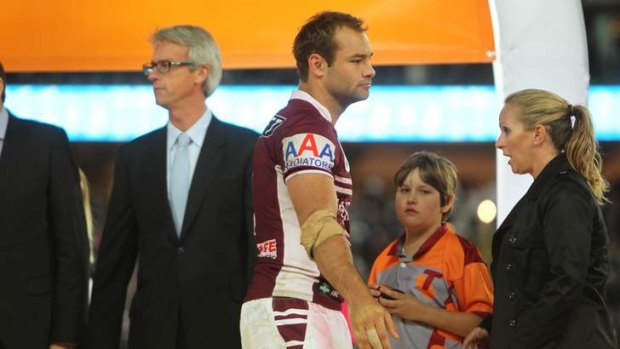 Still scarred: Brett Stewart walks away from David Gallop after Manly's win in the 2011 grand final.