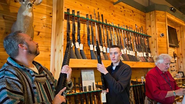 Customers in the Huron Valley Guns store in Milford, Michigan.