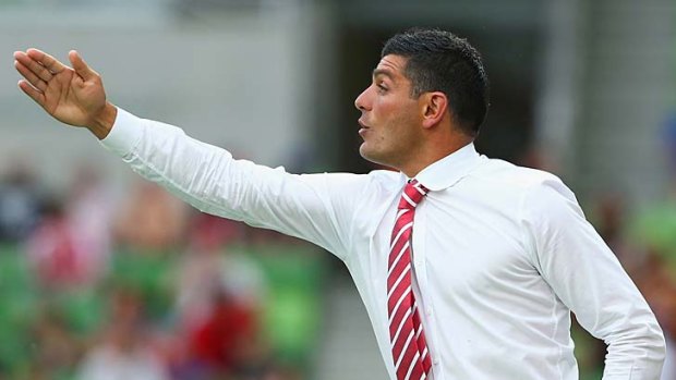 Heart coach John Aloisi gestures to his players during the game against the Newcastle Jets.