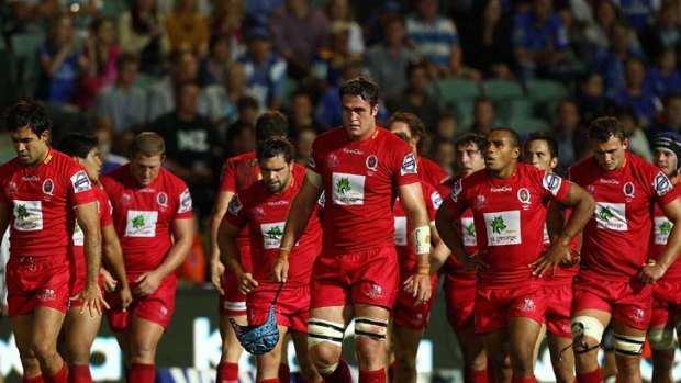 Penthouse to outhouse &#8230; James Horwill leads the defending champions off the pitch at half-time of the Reds' 45-19 loss to the Force in Perth on Saturday night.