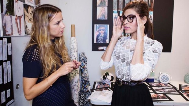 Charlotte Ronson introducing Eva Mendes to her new eyewear range for Vogue Eyewear. 