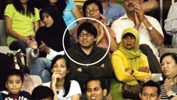 Behind the wig and glasses ... Gayus Tambunan confessed he was the man photographed at the tennis championships in Bali.