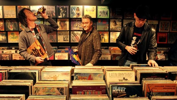 Record bar &#8230; Mojo owner Neville Sergent (centre) with Jon Ruttan and music fan Garth Sundberg.