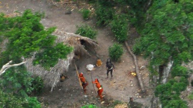 Uncontacted Indians of the Envira, who have never before had any contact with the outside world, photographed during an overflight in May 2008.