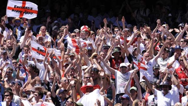 Well done, lads  ... England's Barmy  Army celebrates its team's retention of the famed  urn this summer.