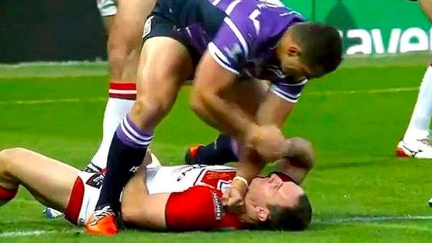 Six-month ban: Ben Flower punches Lance Hohaia in the Super League Grand Final.