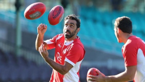Wise old master: Sydney Swans veteran Adam Goodes has a few balls in the air at training.