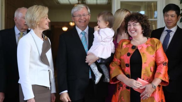 Prime Minister Kevin Rudd tickles his granddaughter Joesphine with the Governor General Quentin Bryce and his wife Therese Rein at Government House in Canberra.