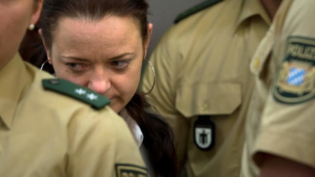 Defendant Beate Zschaepe arrives in court on the second day of the NSU neo-Nazi murder trial on May 14, 2013 in Munich, Germany.