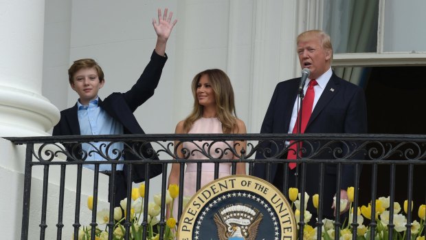 Barron and Melania Trump, pictured with President Donald Trump, have so far remained in New York.  