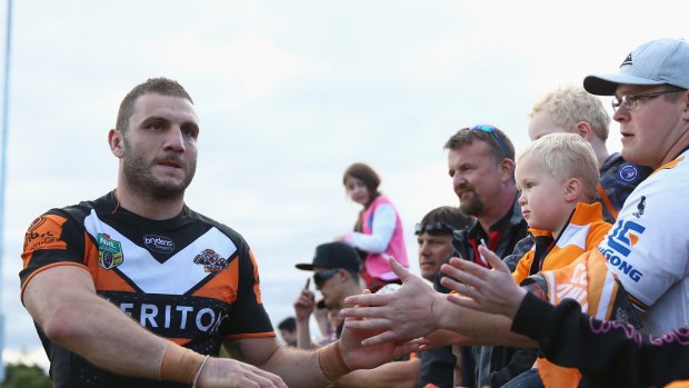 Stepping down: Robbie Farah with the Wests Tigers fans after the last home game of the season.